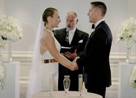 wedding couple with officiants