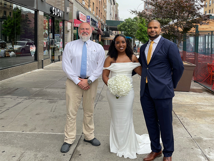 Wedding Officiant Peter Boruchowitz marries Bride and Groom on a NYC sidewalk